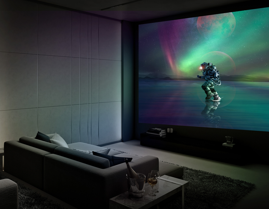 A luxury home theater with a high-end project displaying a space scene.
